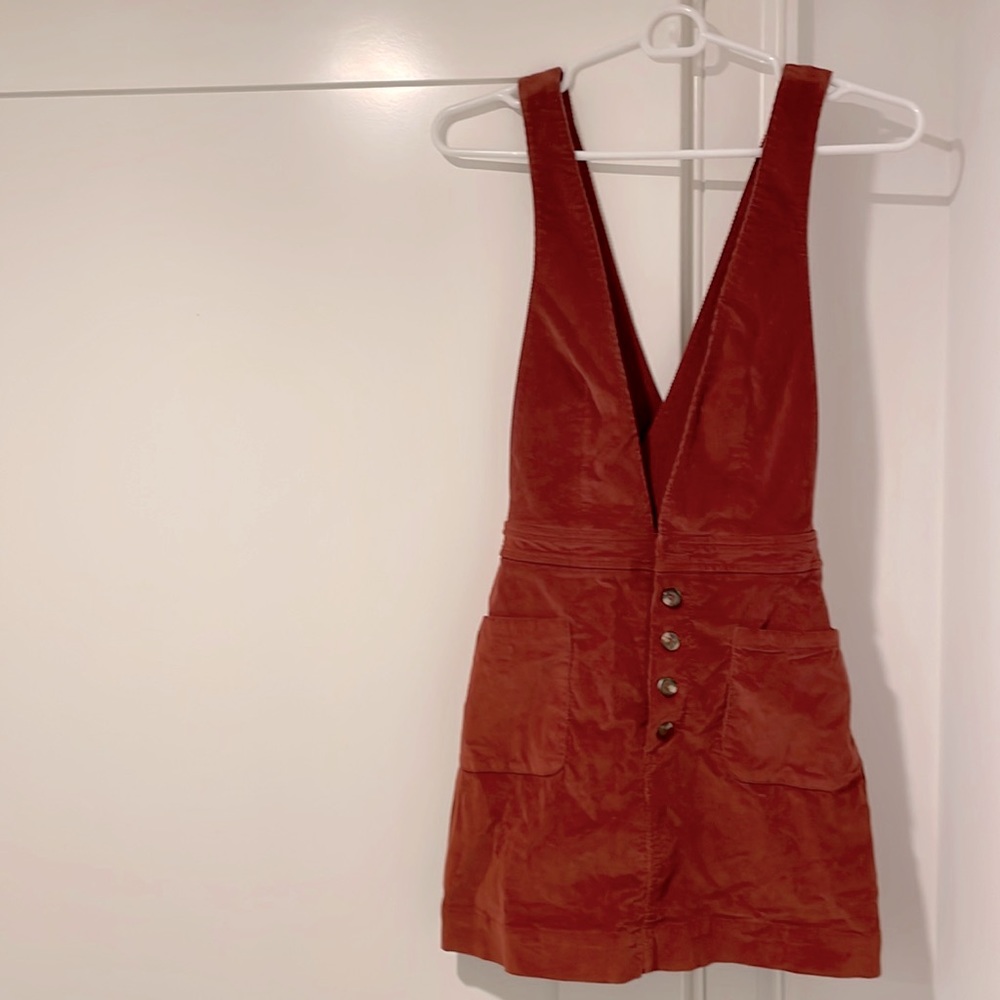 Free People, Overalls Skirt. Corduroy material in a Burnt Orange shade. Size 2.